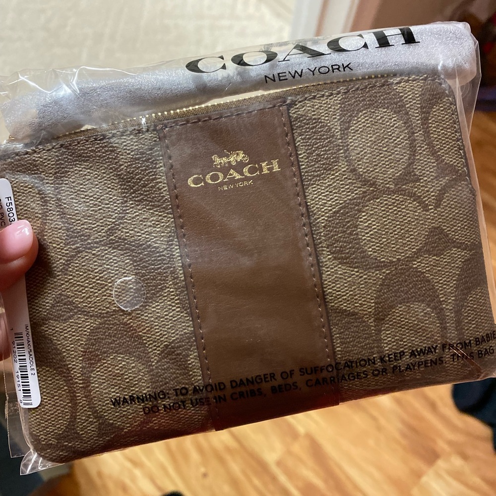 Coach signature leather corner zip wristlet, medium khaki saddle